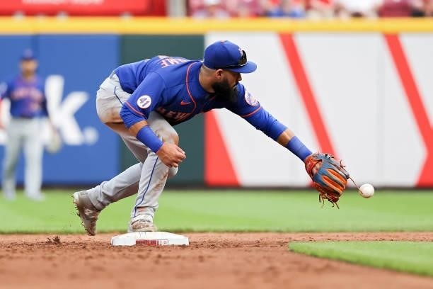 Luis Guillorme of the New York Mets attempts to catch a throw at second base in the second inning against the Cincinnati Reds at Great American Ball...