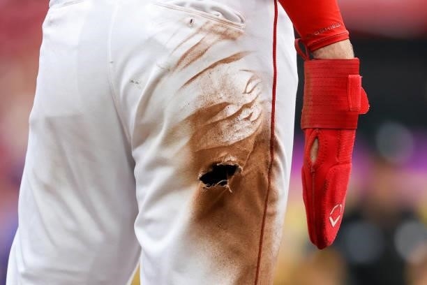 Detail view of a hole in the pants of Tyler Stephenson of the Cincinnati Reds in the second inning against the New York Mets at Great American Ball...