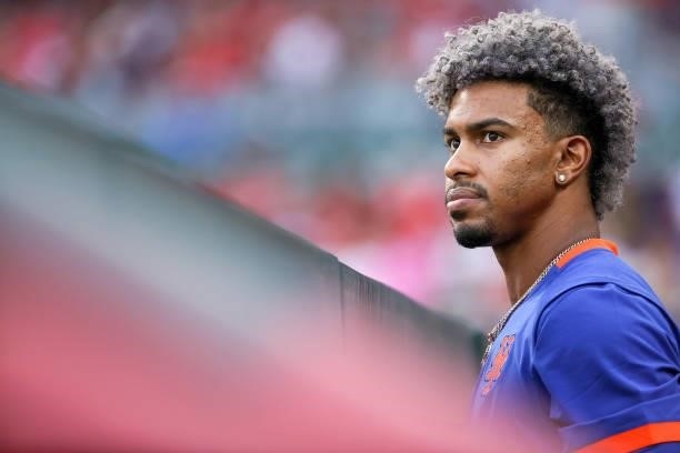 Francisco Lindor of the New York Mets looks on from the dugout in the third inning against the Cincinnati Reds at Great American Ball Park on July...