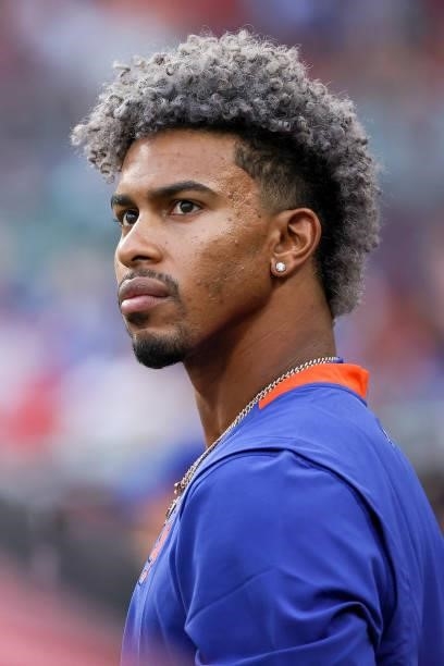 Francisco Lindor of the New York Mets looks on from the dugout in the third inning against the Cincinnati Reds at Great American Ball Park on July...
