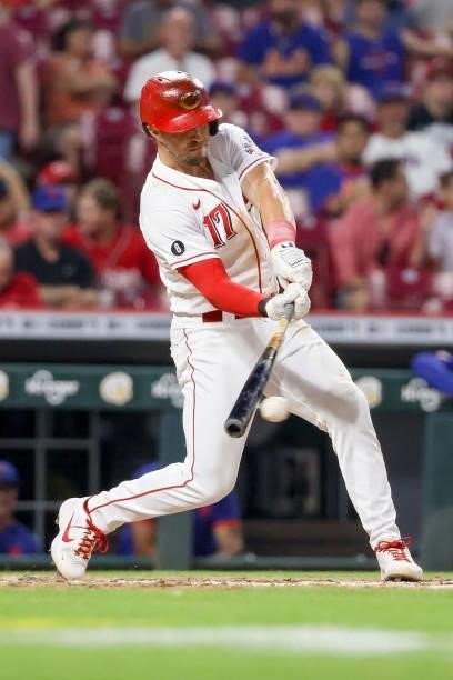 Kyle Farmer of the Cincinnati Reds hits a single in the fifth inning against the New York Mets at Great American Ball Park on July 19, 2021 in...