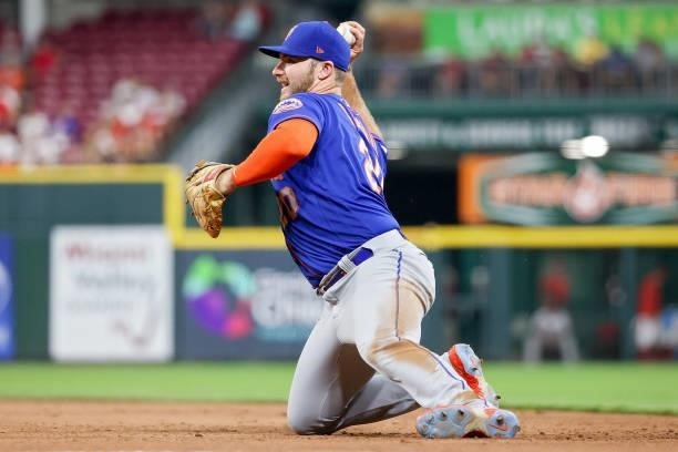 Pete Alonso of the New York Mets throws to first base in the sixth inning against the Cincinnati Reds at Great American Ball Park on July 19, 2021 in...