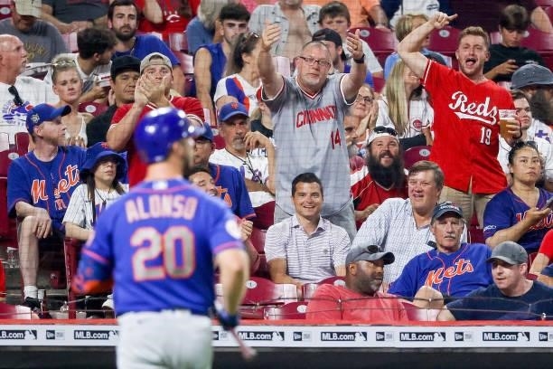 Cincinnati Reds fans reacts after Pete Alonso of the New York Mets struck out in the sixth inning at Great American Ball Park on July 19, 2021 in...