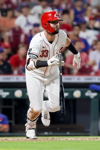 Jesse Winker of the Cincinnati Reds hits a double in the seventh inning against the New York Mets at Great American Ball Park on July 19, 2021 in...