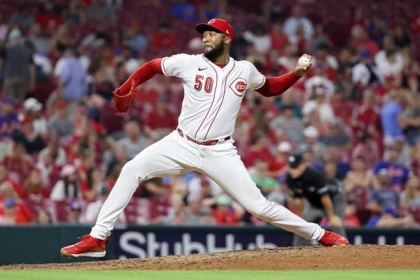 Amir Garrett of the Cincinnati Reds pitches in the seventh inning against the New York Mets at Great American Ball Park on July 19, 2021 in...