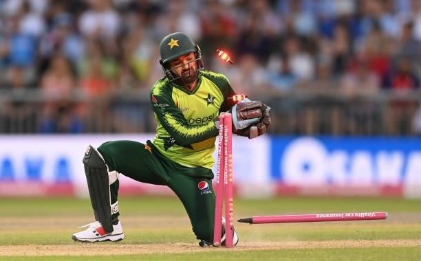 Mohammad Rizwan of Pakistan breaks the stumps during the 3rd Vitality T20 International between England and Pakistan at Emirates Old Trafford on July...