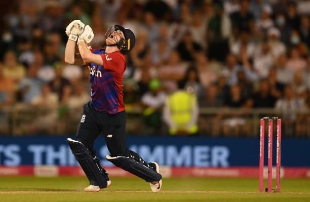 Eoin Morgan of England hits the ball in the air during the 3rd Vitality T20 International between England and Pakistan at Emirates Old Trafford on...