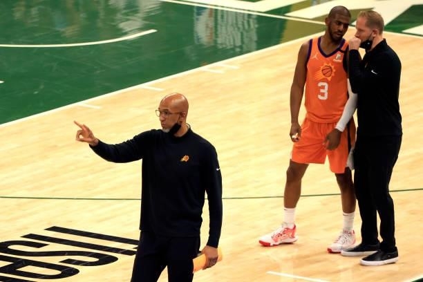 Head coach Monty Williams of the Phoenix Suns signals to his team during the first half in Game Six of the NBA Finals against the Milwaukee Bucks at...