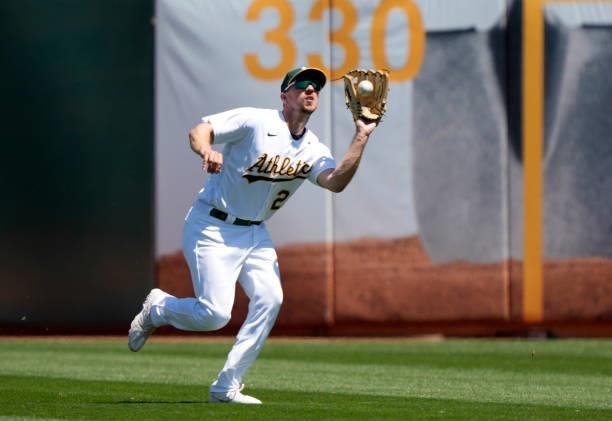 Stephen Piscotty of the Oakland Athletics catches a fly ball off the bat of Taylor Ward of the Los Angeles Angels in the top of the six inning at...