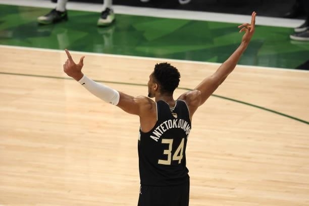 Giannis Antetokounmpo of the Milwaukee Bucks celebrates after defeating the Phoenix Suns in Game Six to win the 2021 NBA Finals at Fiserv Forum on...