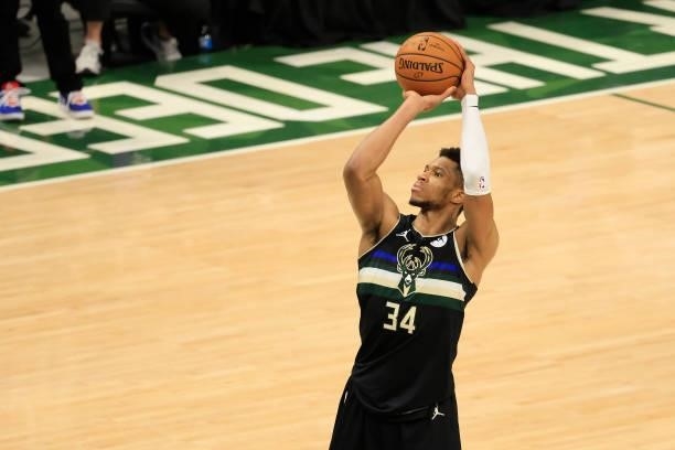 Giannis Antetokounmpo of the Milwaukee Bucks shoots a free throw against the Phoenix Suns during the second half in Game Six of the NBA Finals at...