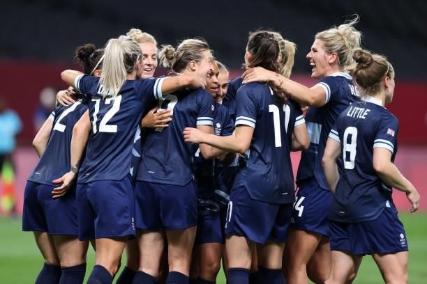 Ellen White of Team Great Britain celebrates with Millie Bright and teammates after scoring their side's second goal during the Women's First Round...