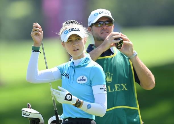 Nelly Korda of USA and caddie look on during the Pro-Am prior to the start of the The Amundi Evian Championship at Evian Resort Golf Club on July 21,...