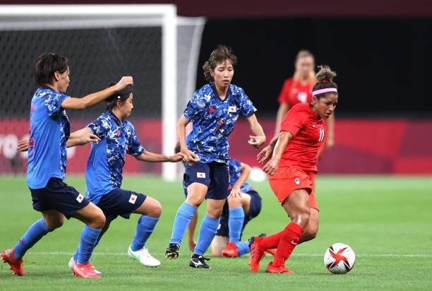 Desiree Scott of Team Canada looks to break away during the Women's First Round Group E match between Japan and Canada during the Tokyo 2020 Olympic...