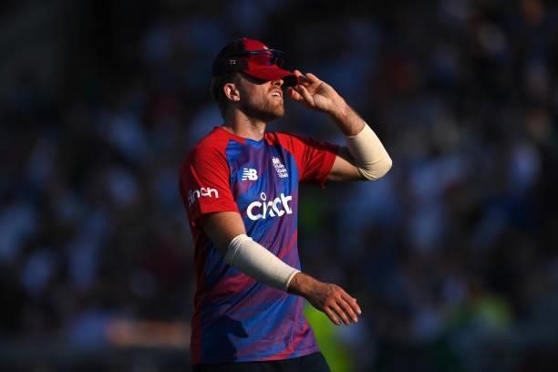 England fielder David Willey reacts during the 3rd Vitality T20 match between England and Pakistan at Emirates Old Trafford on July 20, 2021 in...