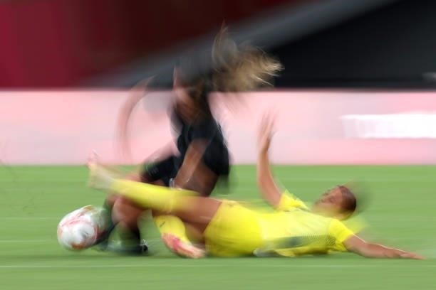 Abby Erceg of Team New Zealand is challenged by Sam Kerr of Team Australia during the Women's First Round Group G match between Australia and New...
