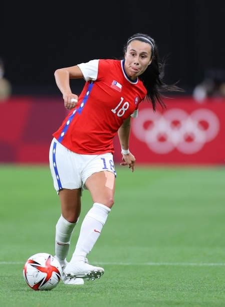 Karen Araya of Team Chile passes the ball during the Women's First Round Group E match between Great Britain and Chile during the Tokyo 2020 Olympic...