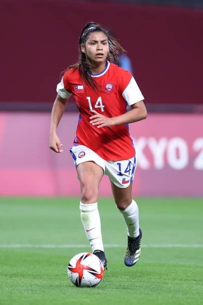 Daniela Pardo of Team Chile runs with the ball during the Women's First Round Group E match between Great Britain and Chile during the Tokyo 2020...