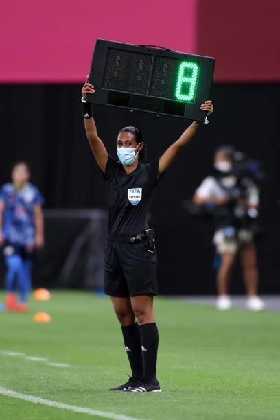 Fourth Official, Maria Rivet raises the Substitute board during the Women's First Round Group E match between Japan and Canada during the Tokyo 2020...