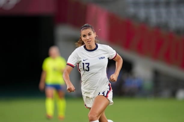 Alex Morgan of the United States moves to the ball during a game between Sweden and USWNT at Tokyo Stadium on July 21, 2021 in Tokyo, Japan.