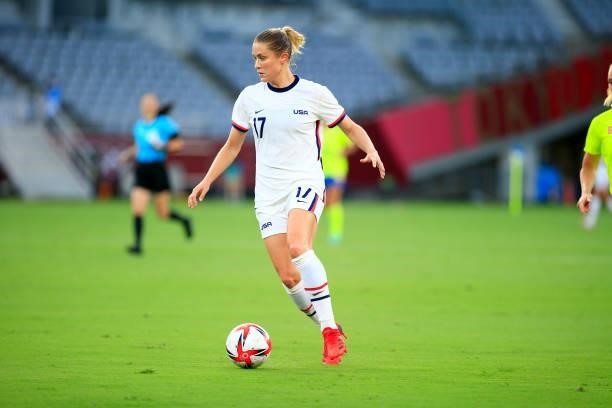 Abby Dahlkemper of the United States moves with the ball during a game between Sweden and USWNT at Tokyo Stadium on July 21, 2021 in Tokyo, Japan.
