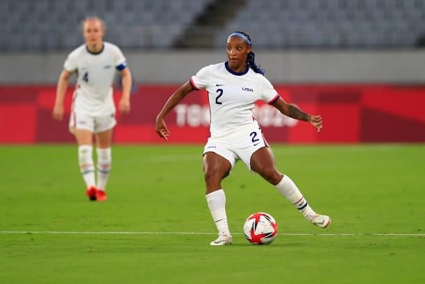 Crystal Dunn of the United States crosses a ball during a game between Sweden and USWNT at Tokyo Stadium on July 21, 2021 in Tokyo, Japan.