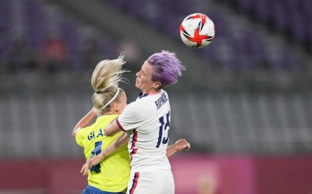 Megan Rapinoe of the United States heads a ball during a game between Sweden and USWNT at Tokyo Stadium on July 21, 2021 in Tokyo, Japan.
