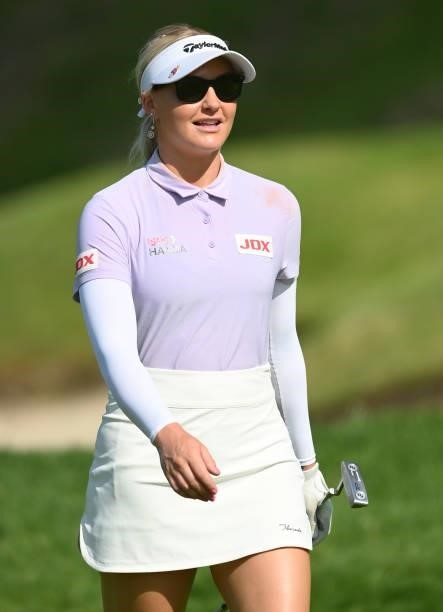 Charley Hull of England looks happy plays a shot during the Pro-Am prior to the start of the The Amundi Evian Championship at Evian Resort Golf Club...