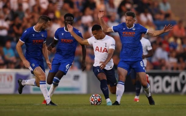 Dane Scarlett of Tottenham Hotspur is put under pressure by Brendan Wiredu and Cole Skuse of Colchester United during the Pre-Season Friendly match...