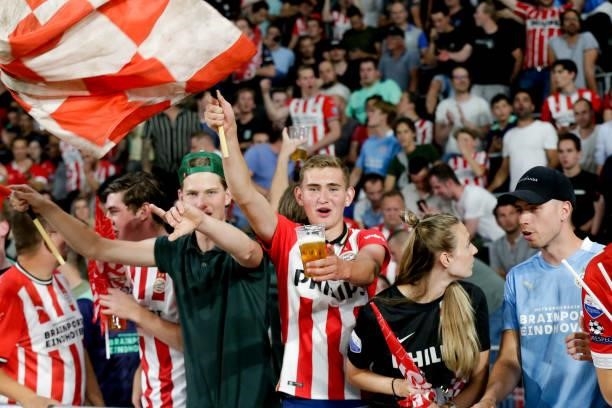 Supporters celebrating during the UEFA Champions League Second Qualifying Round: First Leg match between PSV and Galatasaray at Philips Stadion on...