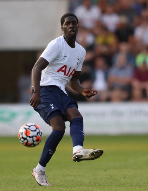 Tobi Omole of Tottenham Hotspur runs with the ball during the Pre-Season Friendly match between Colchester United and Tottenham Hotspur at JobServe...
