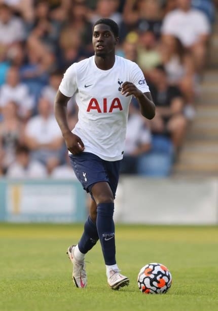 Tobi Omole of Tottenham Hotspur runs with the ball during the Pre-Season Friendly match between Colchester United and Tottenham Hotspur at JobServe...