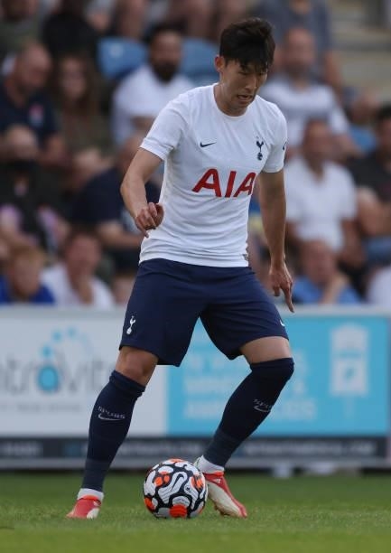 Son Heung-Min of Tottenham Hotspur runs with the ball during the Pre-Season Friendly match between Colchester United and Tottenham Hotspur at...