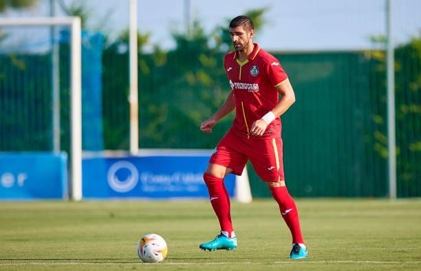 Stefan Mitrovic of Getafe runs with the ball during a Pre-Season friendly match between Getafe and Stade Rennais at Pinatar Arena on July 21, 2021 in...