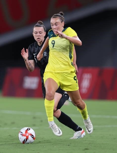 Aivi Luik of New Zealand vies with Caitlin Foord of Australia in the Women's First Round Group G match between New Zealand and Australia during the...