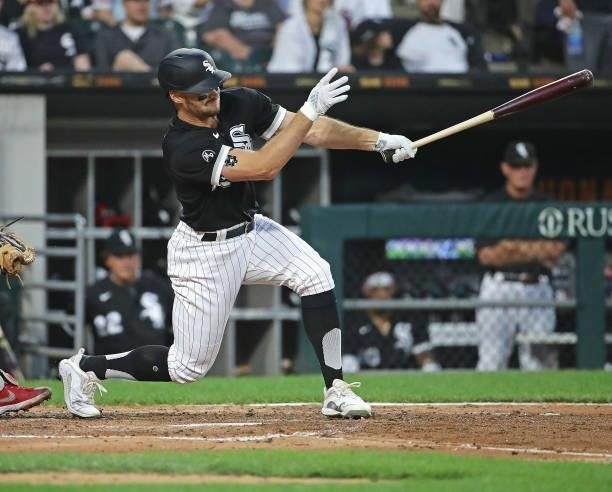 Adam Engel of the Chicago White Sox hits a run scoring single in the 3rd inning against the Minnesota Twins at Guaranteed Rate Field on July 21, 2021...