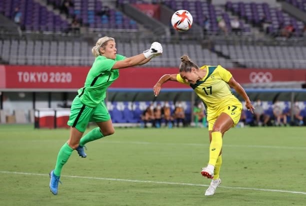 Kyah Simon of Australia vies with Erin Naylor of New Zealand in the Women's First Round Group G match between New Zealand and Australia during the...