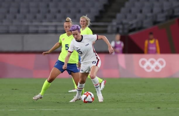 Megan Rapinoe of United States vies with Hanna Bennison of Sweden in the Women's First Round Group G match between Sweden and United States during...