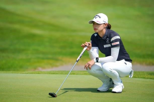 Asuka Kashiwabara of Japan lines up a putt on the 2nd green during the first round of Daito Kentaku eHeyanet Ladies at Takino Country Club on July...