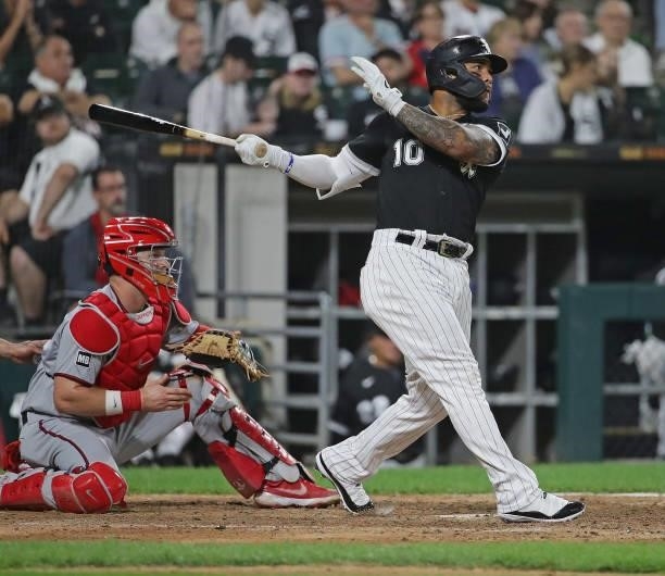 Yoan Moncada of the Chicago White Sox hits a double in the 8th inning against the Minnesota Twins at Guaranteed Rate Field on July 21, 2021 in...