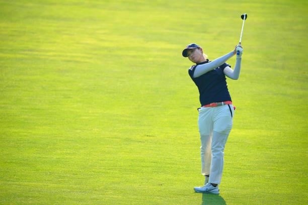 Eri Fukuyama of Japan hits her second shot on the 9th hole during the first round of Daito Kentaku eHeyanet Ladies at Takino Country Club on July 22,...