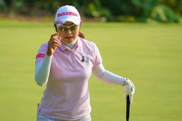 Saiki Fujita of Japan acknowledges fans after holing out on the 9th green during the first round of Daito Kentaku eHeyanet Ladies at Takino Country...