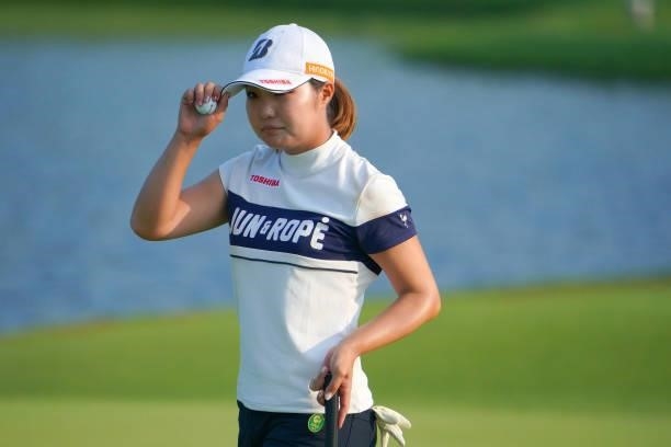 Sayaka Takahashi of Japan acknowledges fans after holing out on the 18th green during the first round of Daito Kentaku eHeyanet Ladies at Takino...