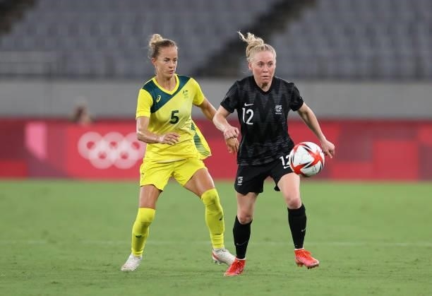 Aivi Luik of Australia vies with Betsy Hassett of New Zealnd in the Women's First Round Group G match during the Tokyo 2020 Olympic Games at Tokyo...