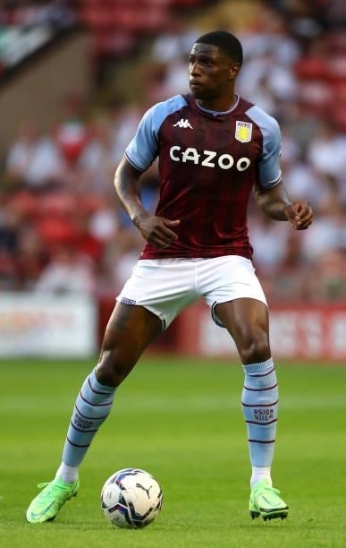 Kortney Hause of Aston Villa controls the ball during the Pre Season Friendly between Walsall and Aston Villa at Banks's Stadium on July 21, 2021 in...