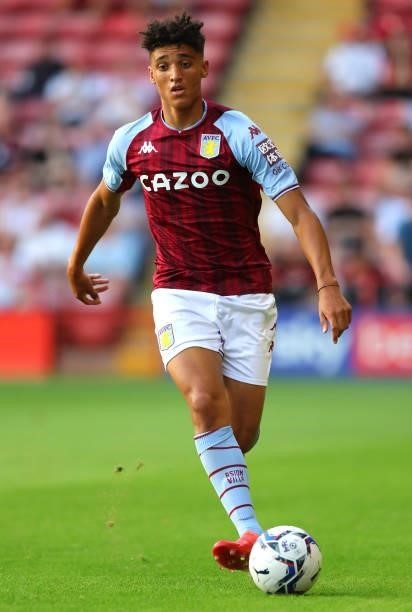 Ben Chrisene of Aston Villa controls the ball during the Pre Season Friendly between Walsall and Aston Villa at Banks's Stadium on July 21, 2021 in...