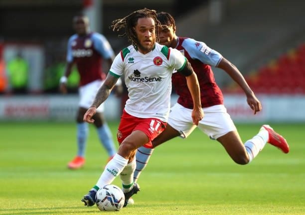 Elijah Adebayo of Walsall controls the ball during the Pre Season Friendly between Walsall and Aston Villa at Banks's Stadium on July 21, 2021 in...