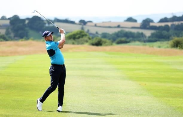 Matt Wallace of England plays his second shot on hole 1 during Day One of the Cazoo Open supported by Gareth Bale at Celtic Manor Resort on July 22,...