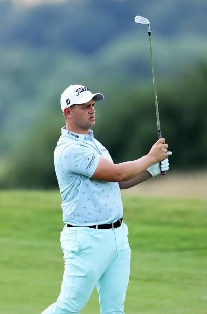 Daniel van Tonder of South Africa plays his second shot on hole 1 during Day One of the Cazoo Open supported by Gareth Bale at Celtic Manor Resort on...