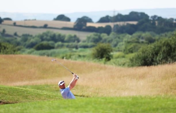 Bradley Dredge of Wales plays his second shot on hole 1 during Day One of the Cazoo Open supported by Gareth Bale at Celtic Manor Resort on July 22,...